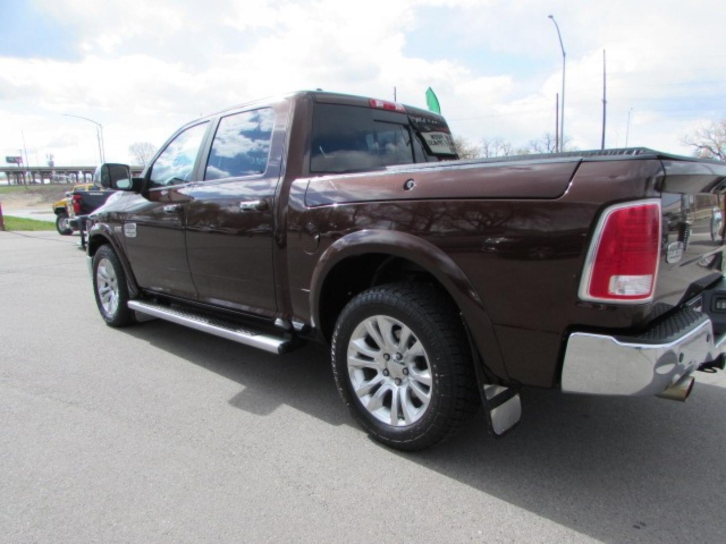 2013 Western Brown /Cattle Tan Leather RAM 1500 Laramie Longhorn (1C6RR7PT9DS) with an 5.7 Hemi V8 engine engine, 8 speed automatic transmission, located at 4562 State Avenue, Billings, MT, 59101, (406) 896-9833, 45.769516, -108.526772 - 2013 RAM 1500 Laramie Longhorn Edition Crew Cab SWB 4WD - Extremely clean! 5.7L V8 OHV 16V Engine - 8 speed automatic transmission - 4WD - 163,381 miles - local trade in - extremely clean Longhorn Edition - climate control - air conditioning - tilt wheel - cruise control - Alpine touchscreen audio - Photo#1